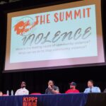 20231011_Violence_Students Question_What are the leading causes of violence_Panelist_Mike McKenzie_NFL Saints Superbowl Champion_Addressing students_Stage and presentation view